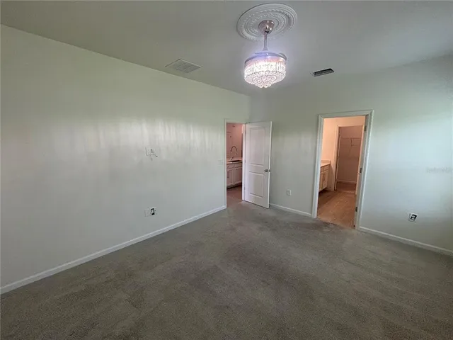 an empty room with a bathroom
