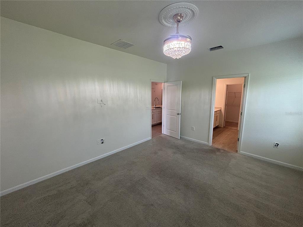 9145 Southwest 58th Circle Ocala, FL 34476 - Photo 26 of 37 an empty room with a bathroom