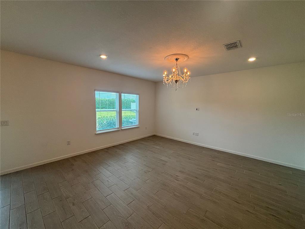 9145 Southwest 58th Circle Ocala, FL 34476 - Photo 29 of 37 a view of an empty room with a window