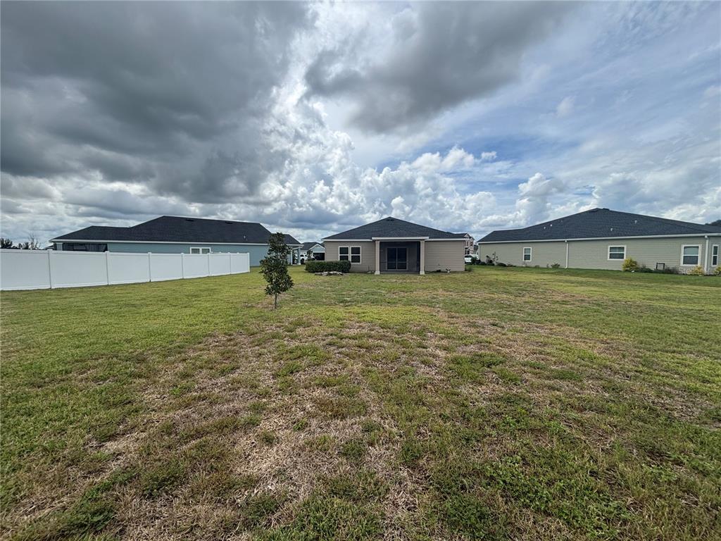 9145 Southwest 58th Circle Ocala, FL 34476 - Photo 34 of 37 an outdoor space with pool and trees