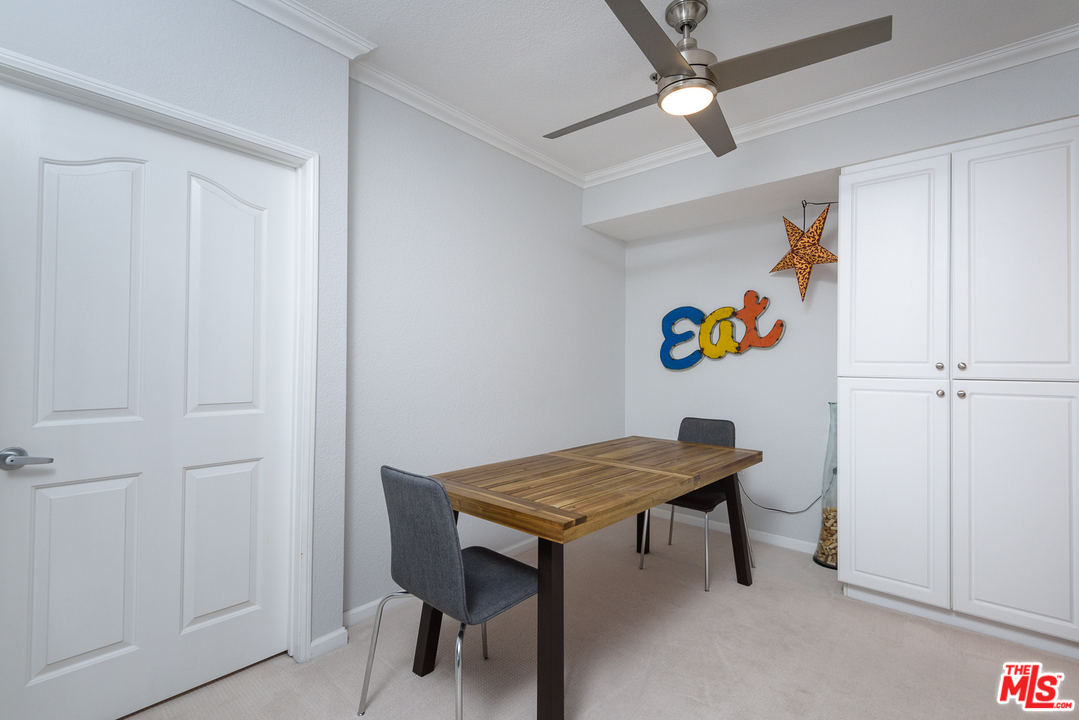 838 Pine Avenue, Unit 216 Long Beach, CA 90813 - Photo 12 of 35 a room with a table and workspace