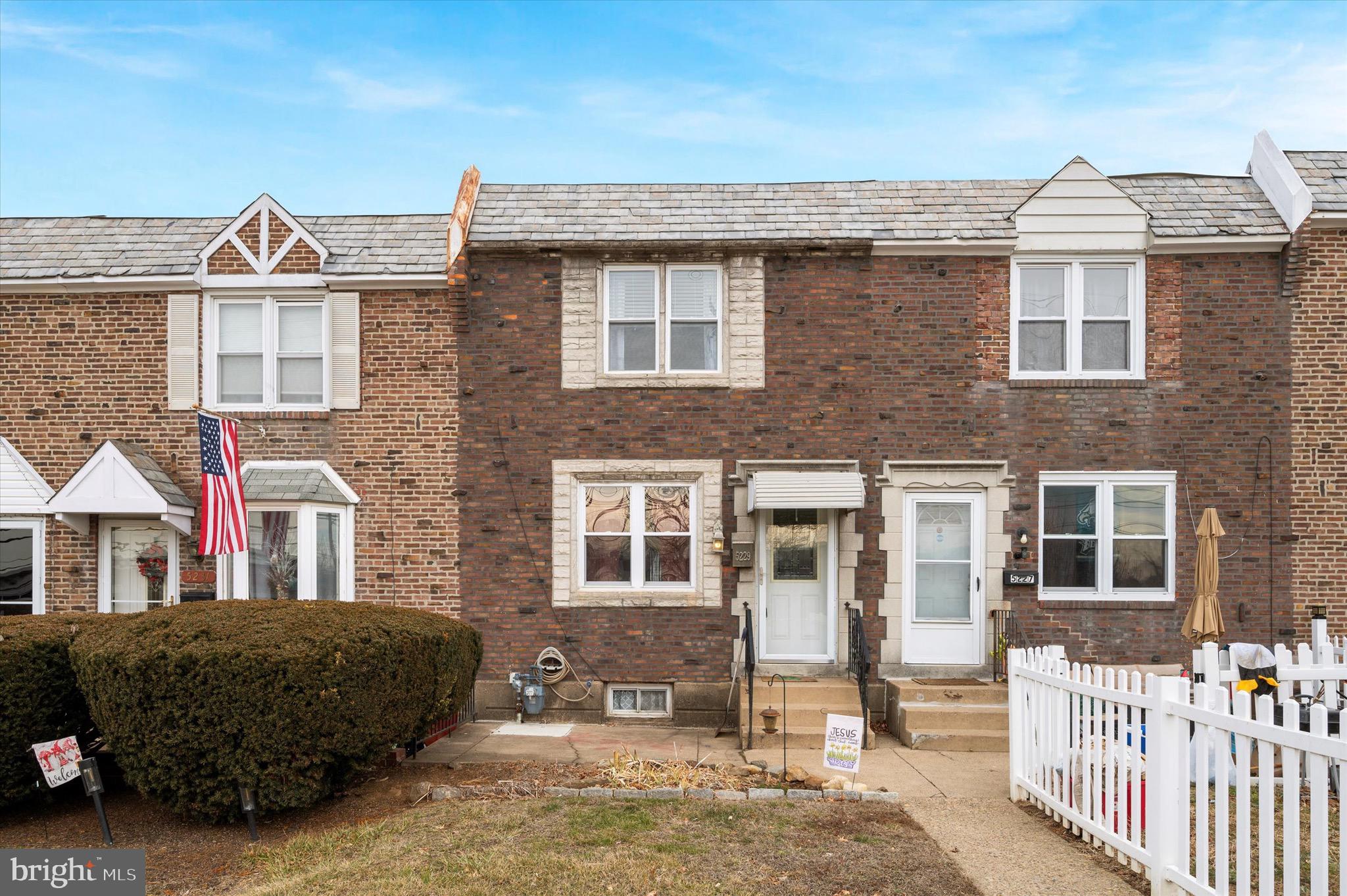 5229 North Springfield Road Clifton Heights, PA 19018 - Photo 1 of 25 a front view of a house with a yard
