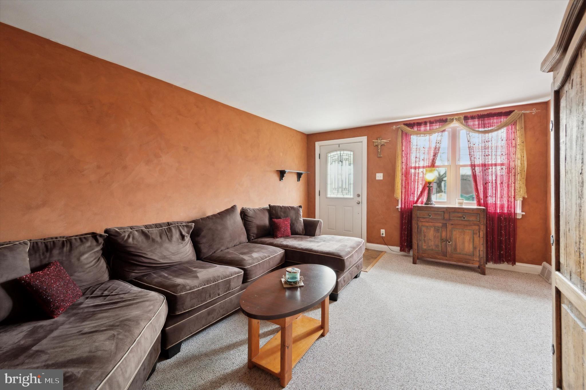 5229 North Springfield Road Clifton Heights, PA 19018 - Photo 4 of 25 a living room with furniture and a flat screen tv