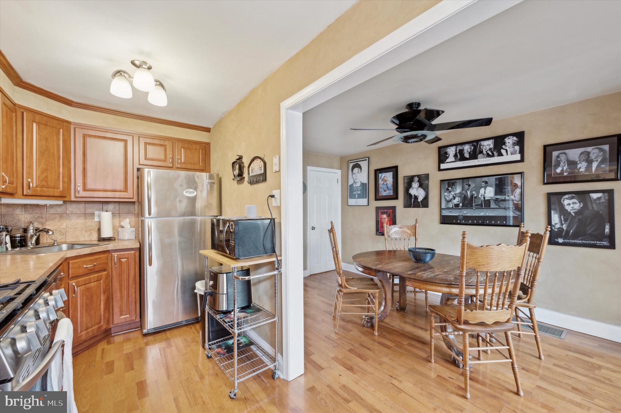 5229 North Springfield Road Clifton Heights, PA 19018 - Photo 10 of 25 a view of a dining room with furniture and wooden floor