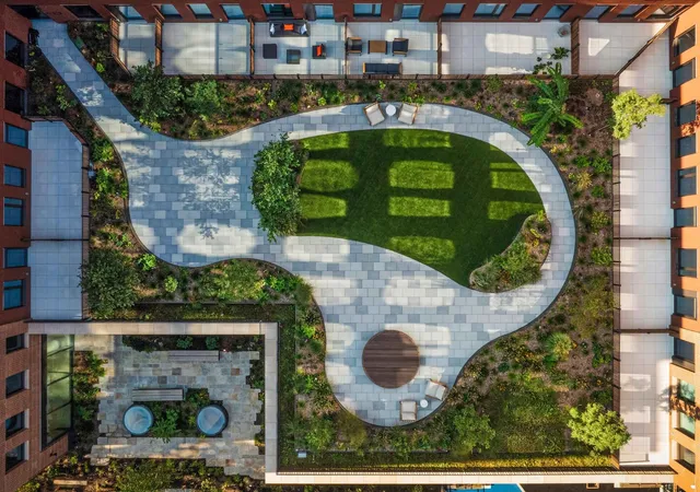 an aerial view of a house with garden space sitting space