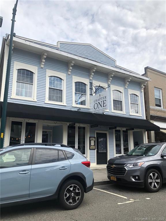 a car parked in front of a house