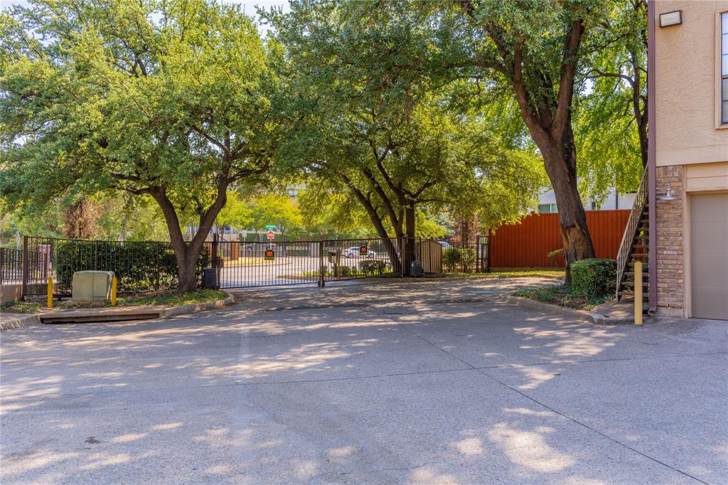 4777 Cedar Springs Road, Unit 8J Dallas, TX 75219 - Photo 30 of 30 a view of road and trees