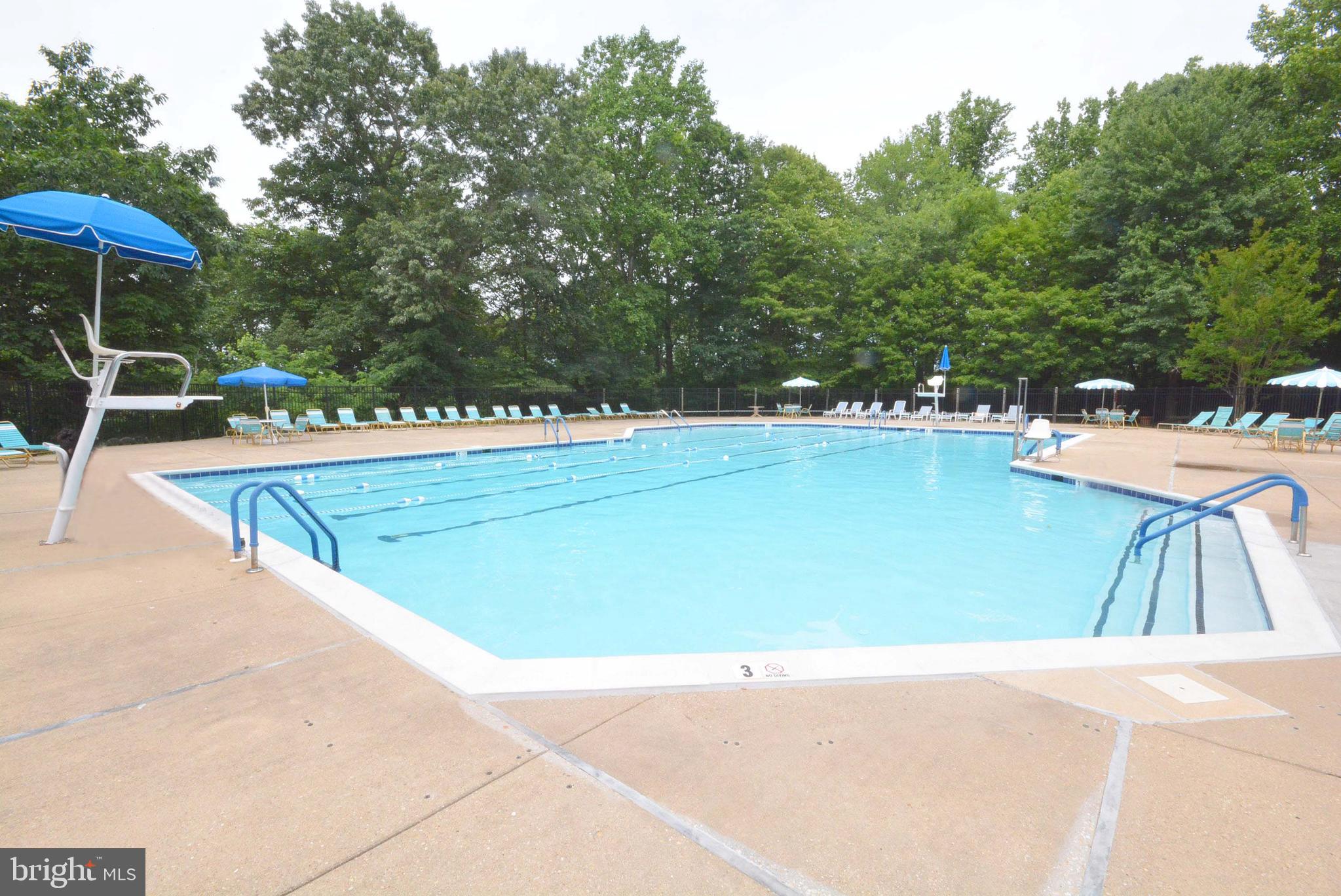 2900 Shipmaster Way, Unit 315 Annapolis, MD 21401 - Photo 38 of 39 a view of a swimming pool with a patio
