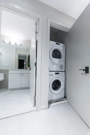 a bathroom with a toilet and a sink
