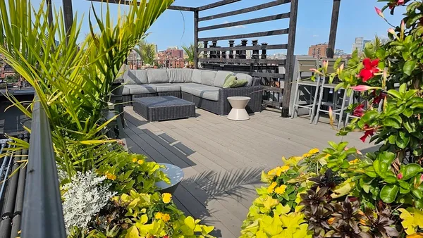 a view of a chairs and table in a patio