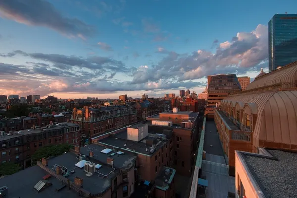 a view of a city with tall buildings
