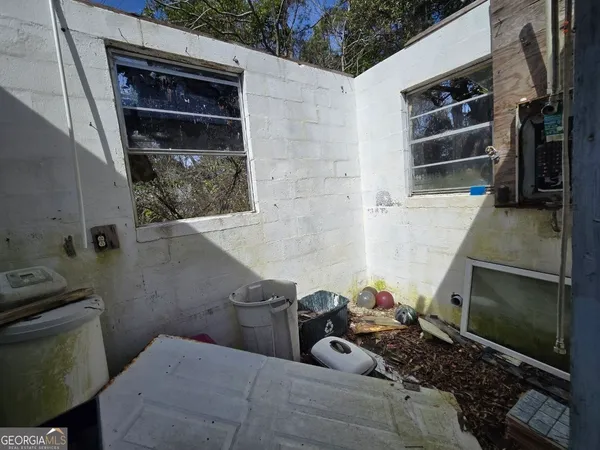 a view of a backyard of the house