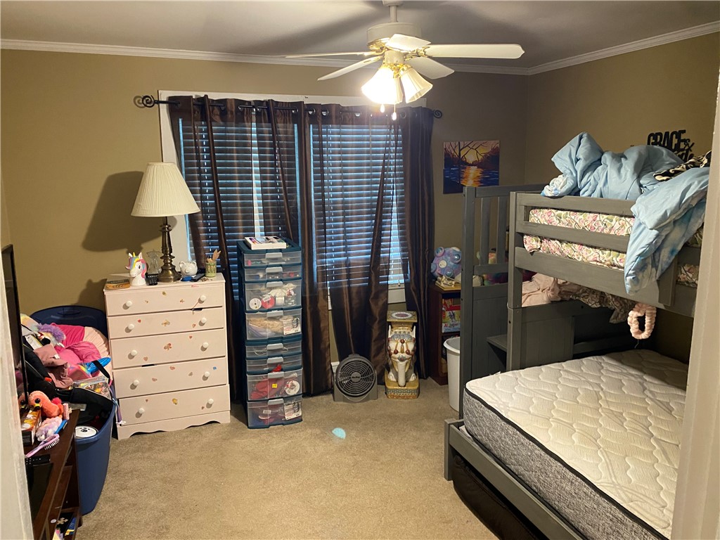 3 Heyward Avenue Honea Path, SC 29654 - Photo 21 of 35 This cozy bedroom offers a warm atmosphere perfect for restful nights and personal space.