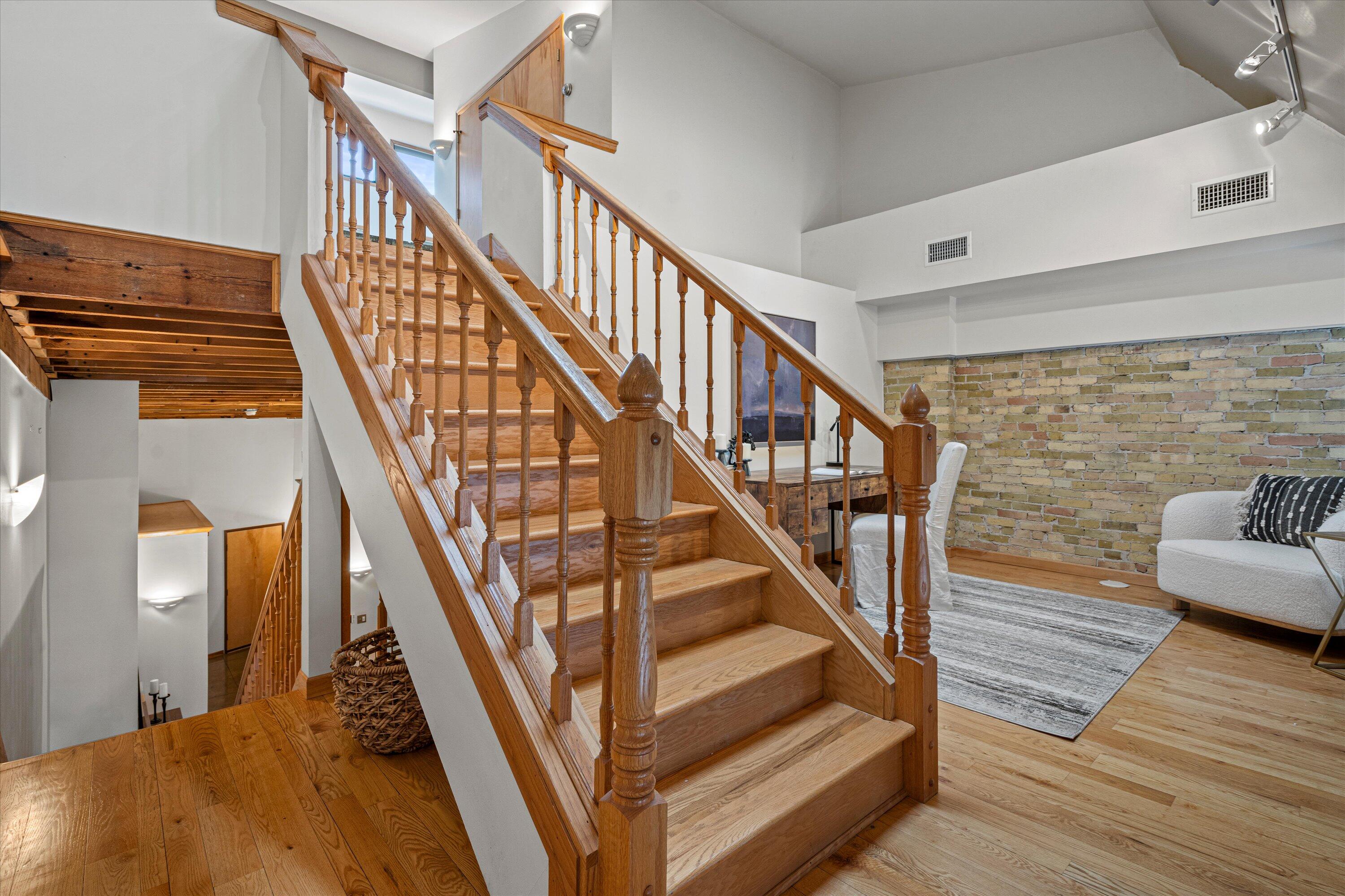 773 North Water Street, Unit 34 Milwaukee, WI 53202 - Photo 16 of 28 Staircase To Primary Bedroom