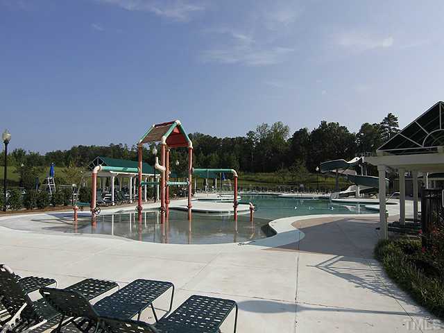 3335 Archdale Drive Raleigh, NC 27614 - Photo 15 of 15 a view of a swimming pool and lounge chairs
