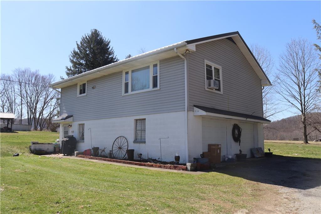 873 Nature Run Road Ligonier, PA 15658 - Photo 15 of 23 a front view of a house with a yard