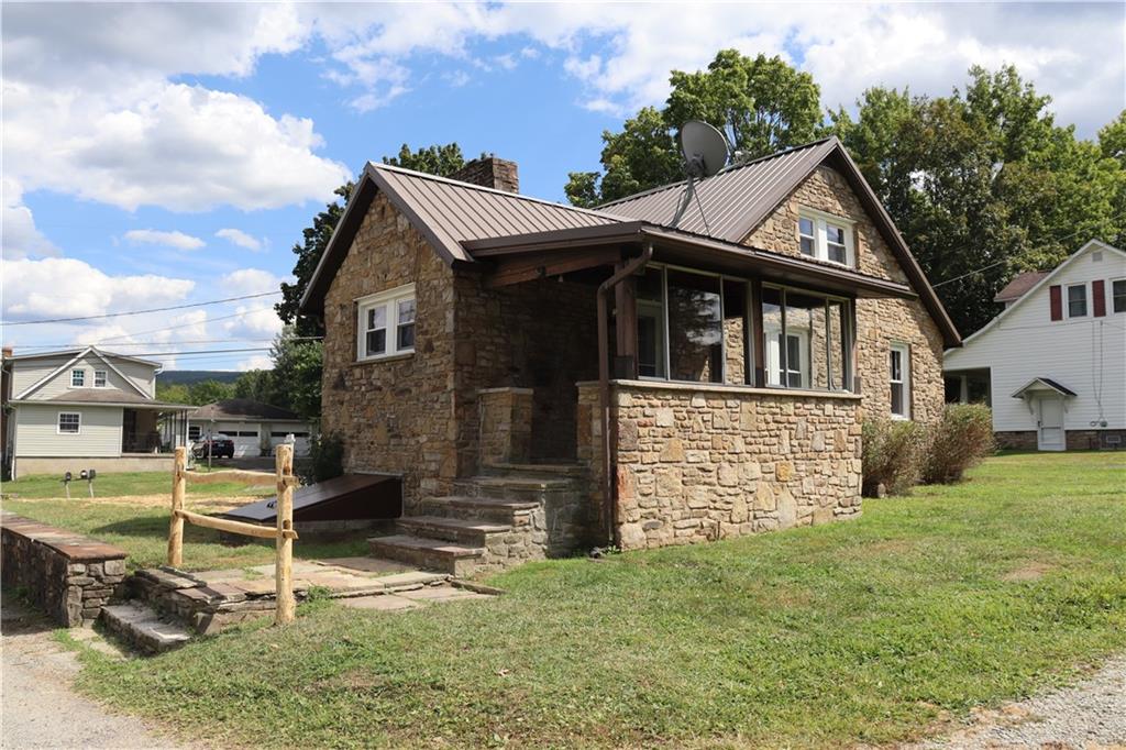 873 Nature Run Road Ligonier, PA 15658 - Photo 2 of 23 a view of a house with a yard