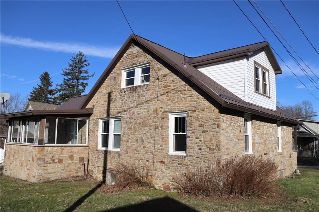 873 Nature Run Road Ligonier, PA 15658 - Photo 4 of 23 a front view of a house with yard