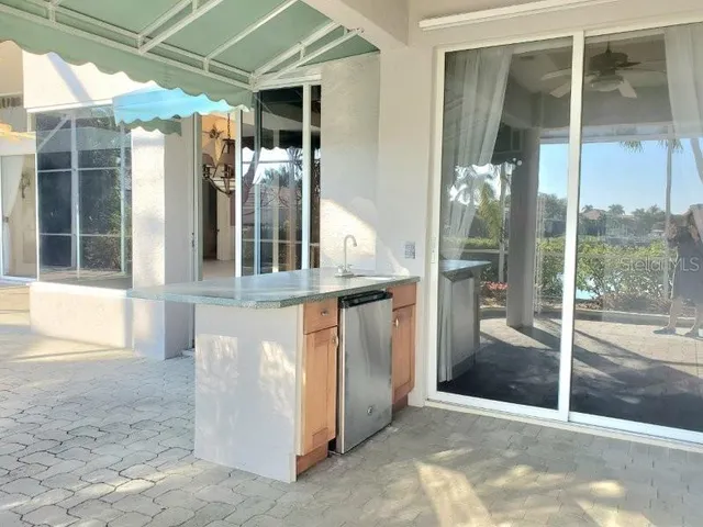 a view of a lake with sitting area