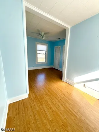 a view of a hallway view with staircase