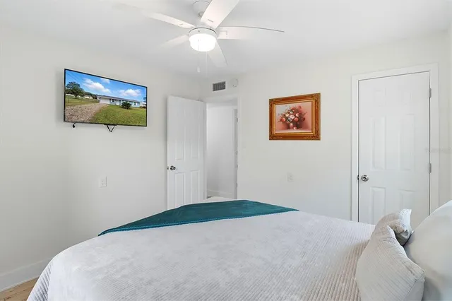 a bathroom with a toilet sink and a mirror