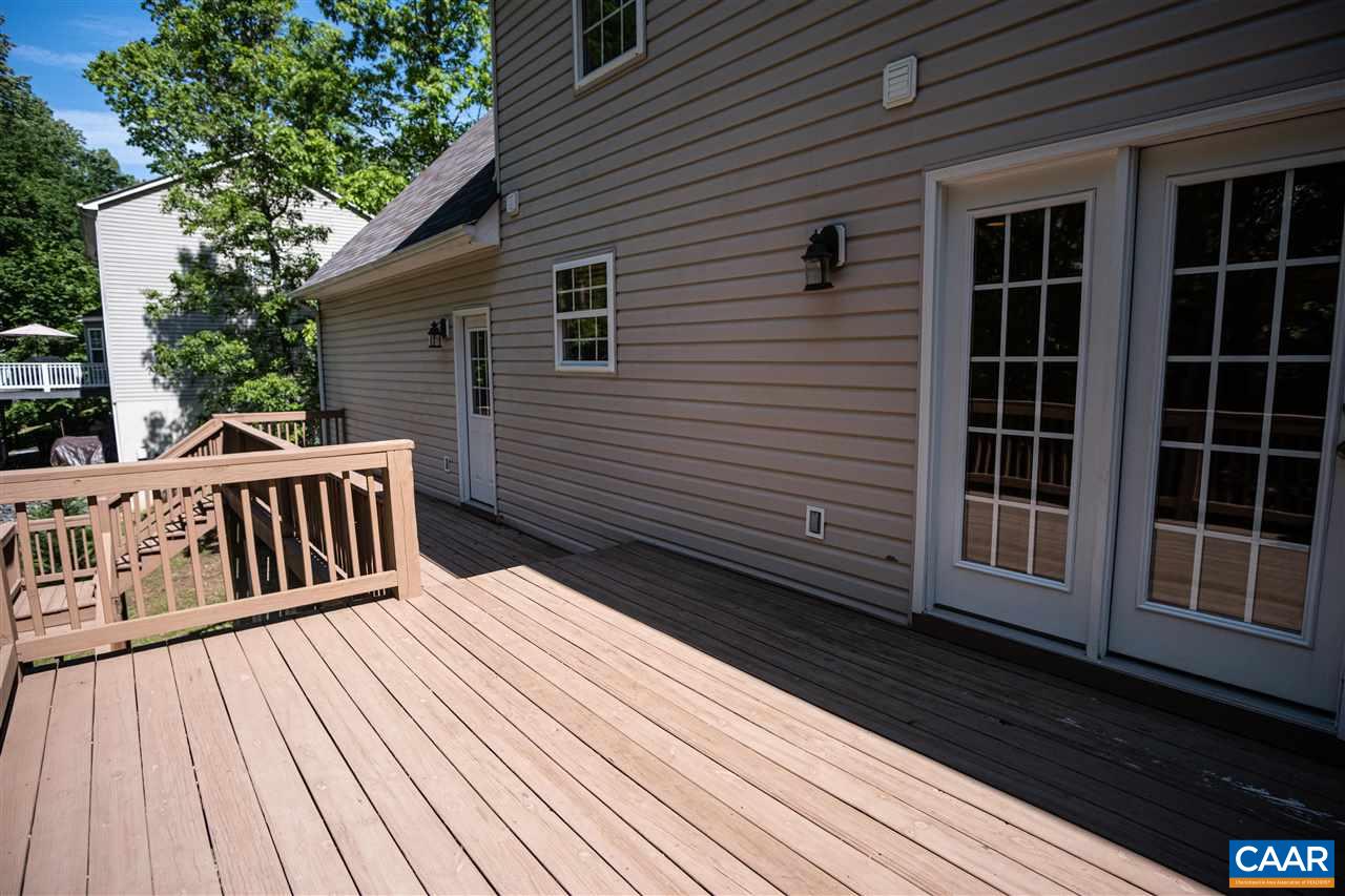 29 Zephyr Road Palmyra, VA 22963 - Photo 5 of 45 a view of a wooden deck with a yard