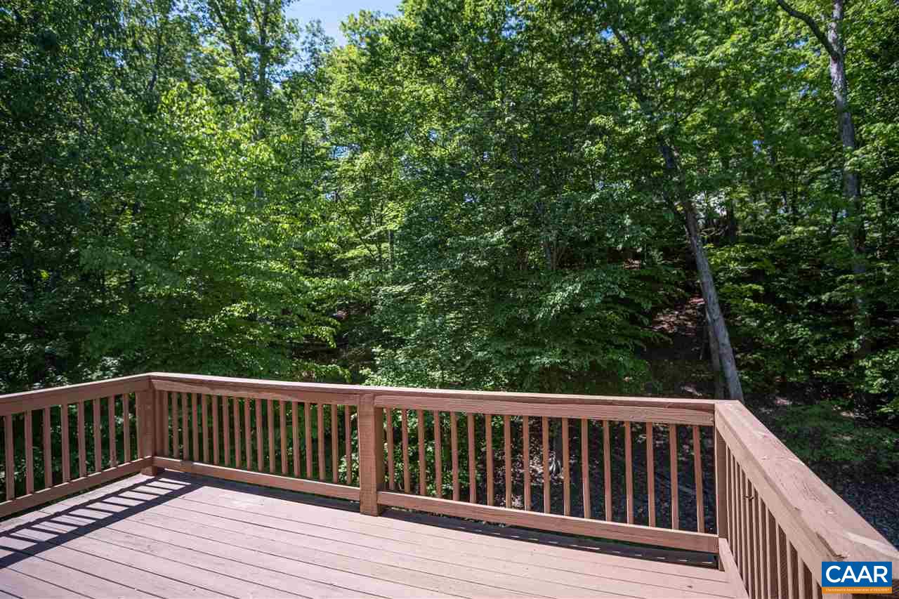 29 Zephyr Road Palmyra, VA 22963 - Photo 7 of 45 a balcony with wooden floor and fence