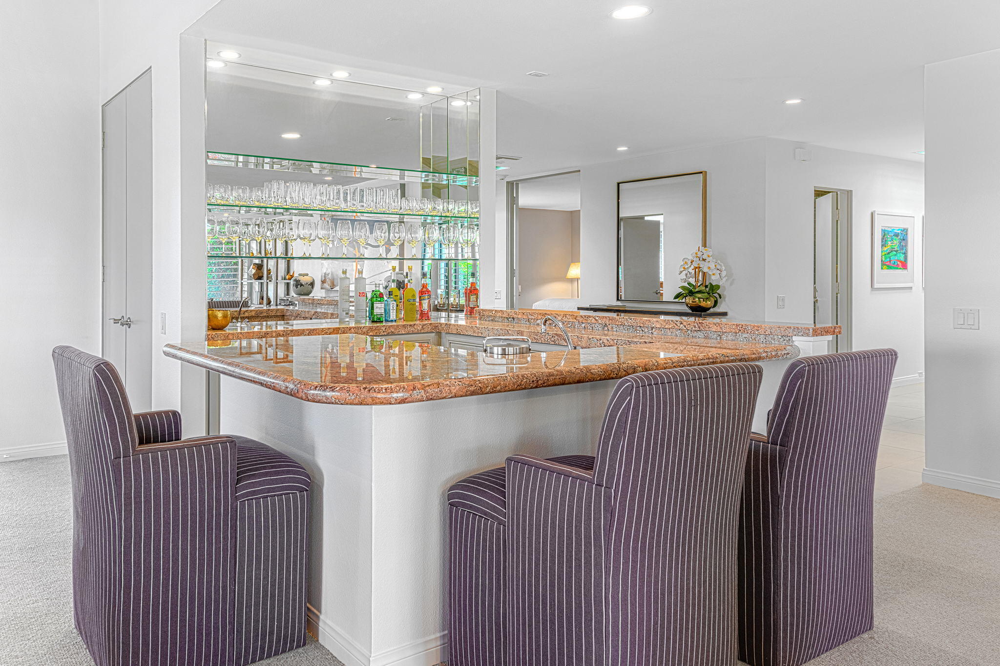 10 Creekside Drive Rancho Mirage, CA 92270 - Photo 15 of 32 a dining hall with stainless steel appliances granite countertop a dining table and chairs