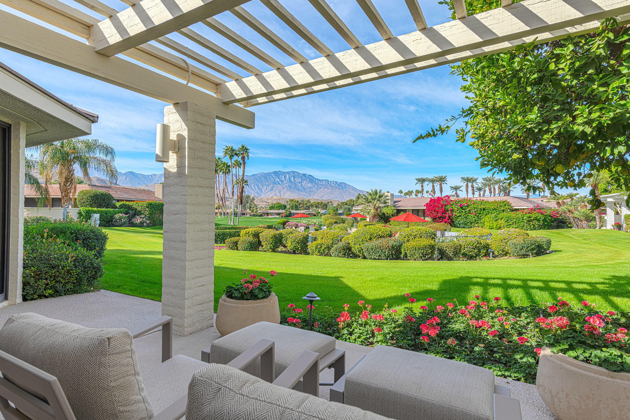 10 Creekside Drive Rancho Mirage, CA 92270 - Photo 2 of 32 a view of a garden with a flower garden