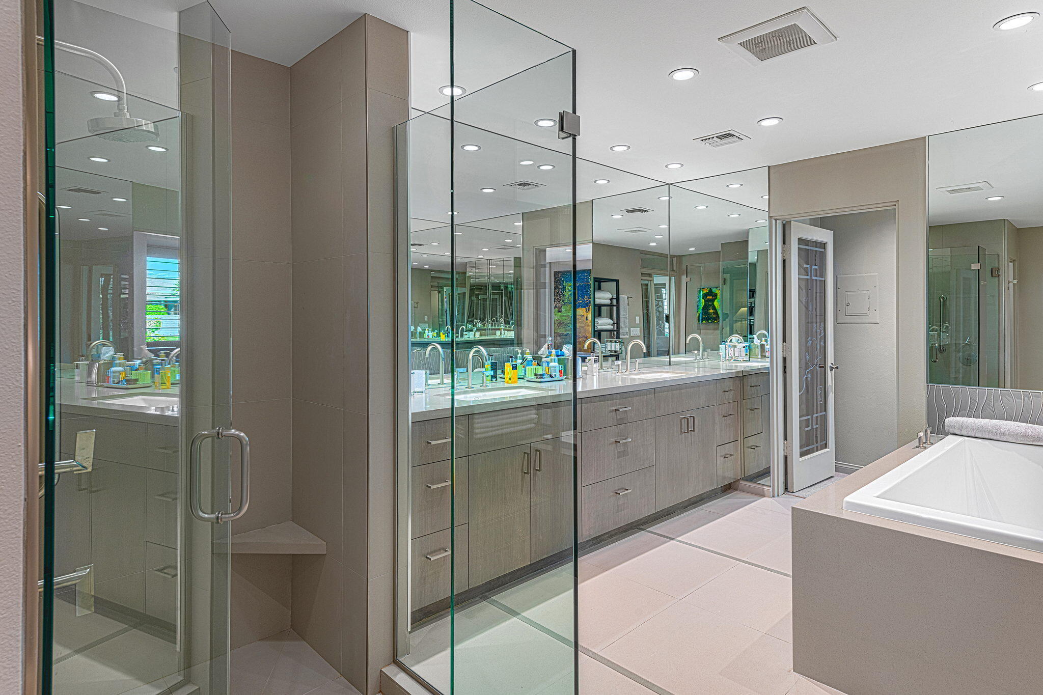 10 Creekside Drive Rancho Mirage, CA 92270 - Photo 26 of 32 a bathroom with a tub sink shower and mirror