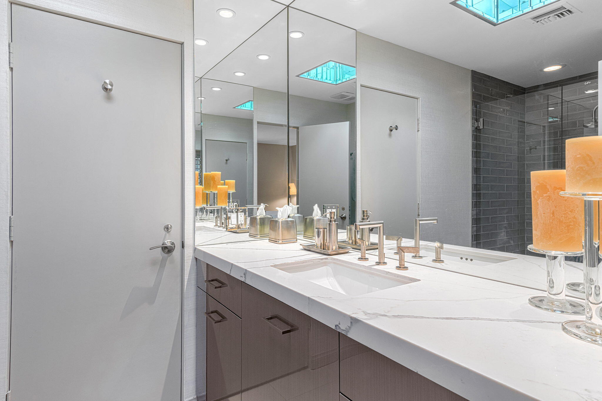 10 Creekside Drive Rancho Mirage, CA 92270 - Photo 29 of 32 a bathroom with a sink and a mirror
