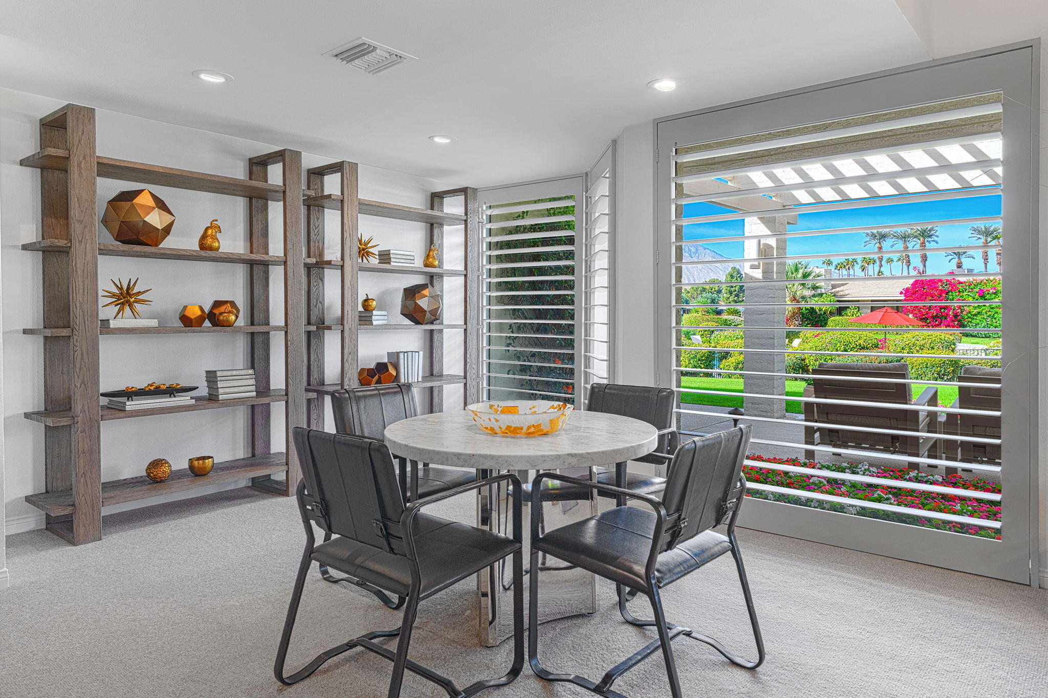 10 Creekside Drive Rancho Mirage, CA 92270 - Photo 3 of 32 a dining room with furniture and window