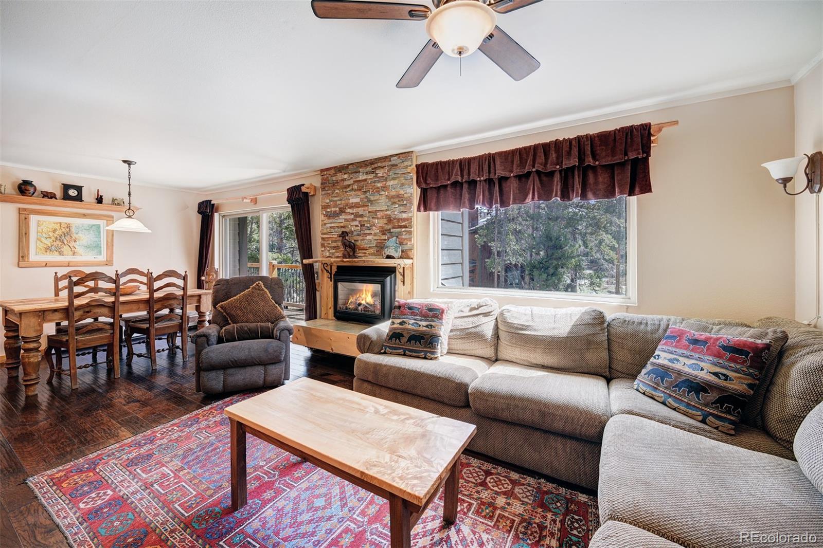 760 Columbine Road, Unit B6 Breckenridge, CO 80424 - Photo 11 of 39 a living room with furniture fireplace and window