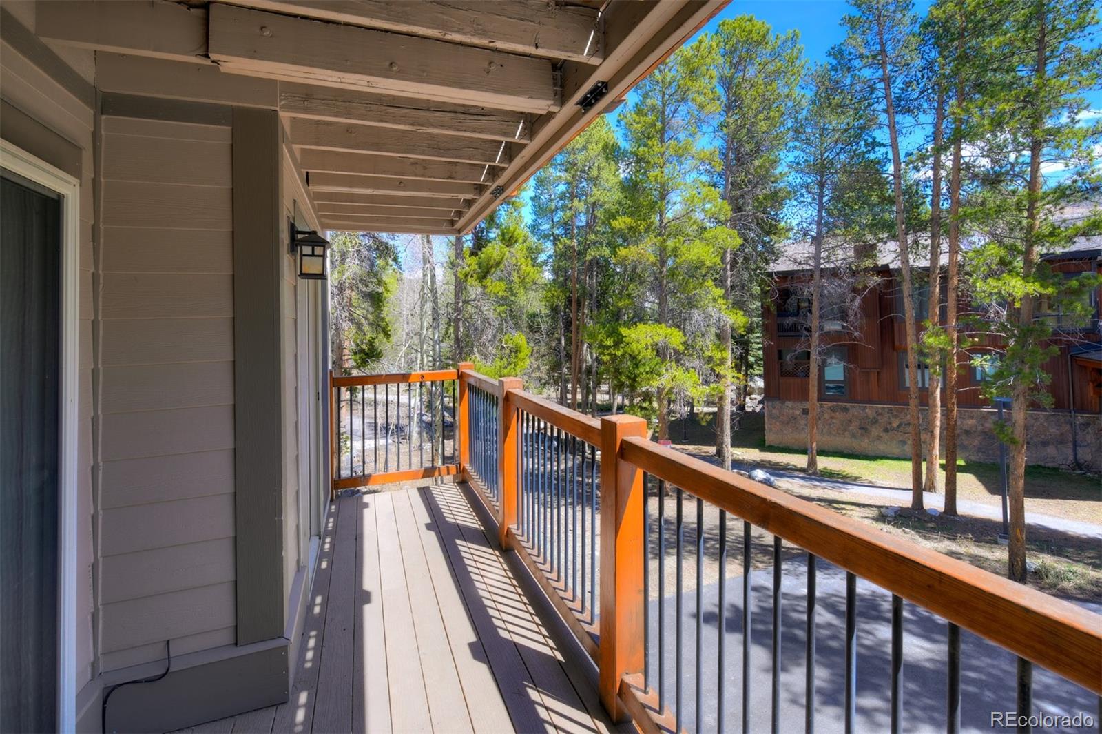 760 Columbine Road, Unit B6 Breckenridge, CO 80424 - Photo 13 of 39 a view of a balcony with wooden floor