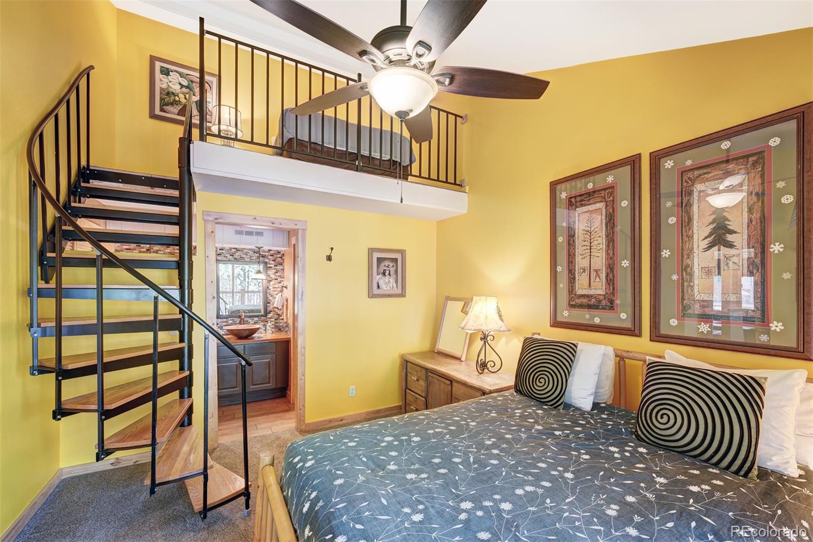 760 Columbine Road, Unit B6 Breckenridge, CO 80424 - Photo 16 of 39 a bedroom with a bed and a window