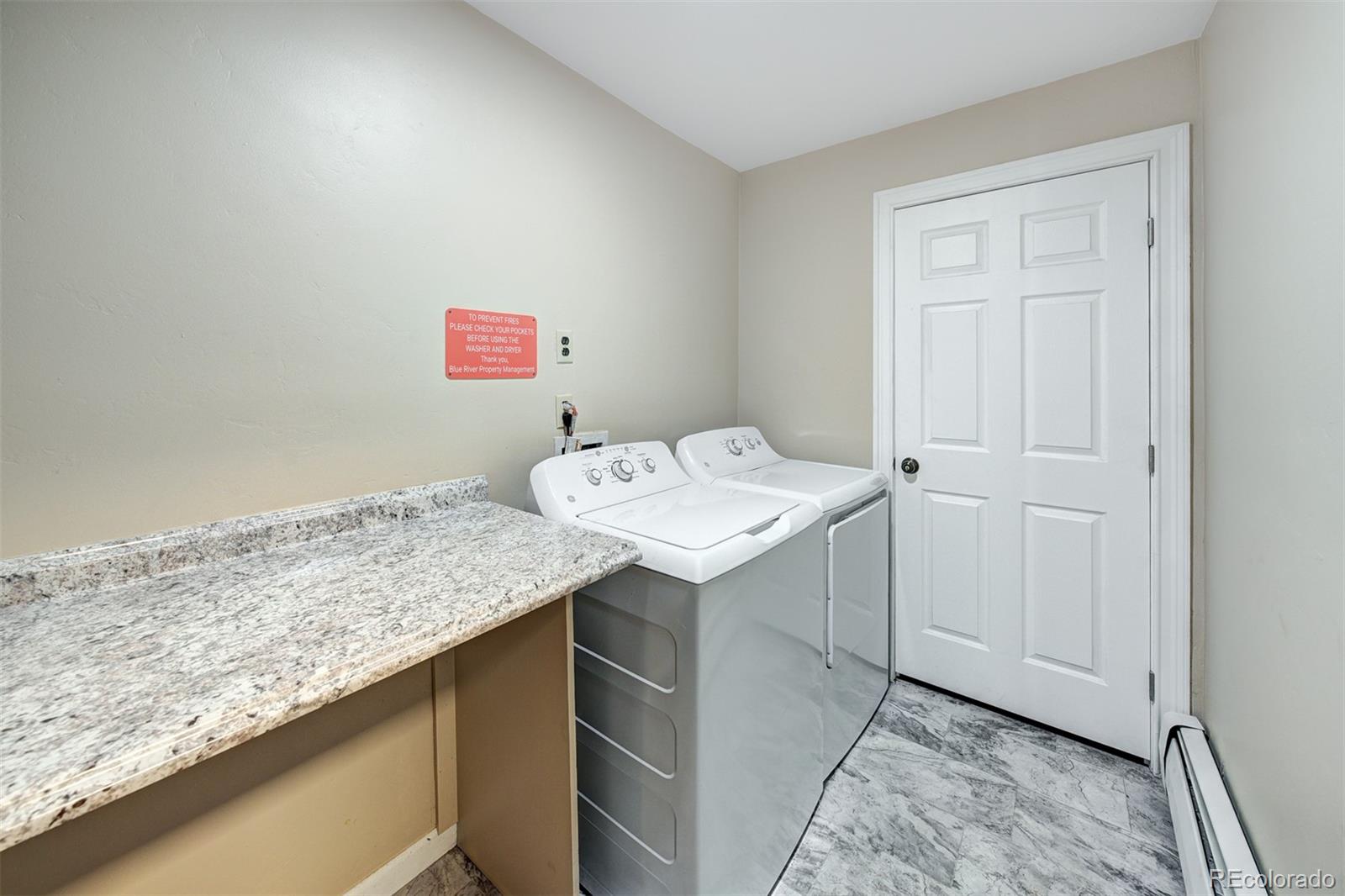 760 Columbine Road, Unit B6 Breckenridge, CO 80424 - Photo 38 of 39 a utility room with a sink washer and dryer