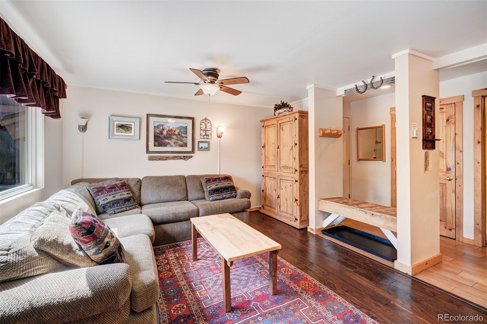 760 Columbine Road, Unit B6 Breckenridge, CO 80424 - Photo 6 of 39 a living room with furniture and a rug