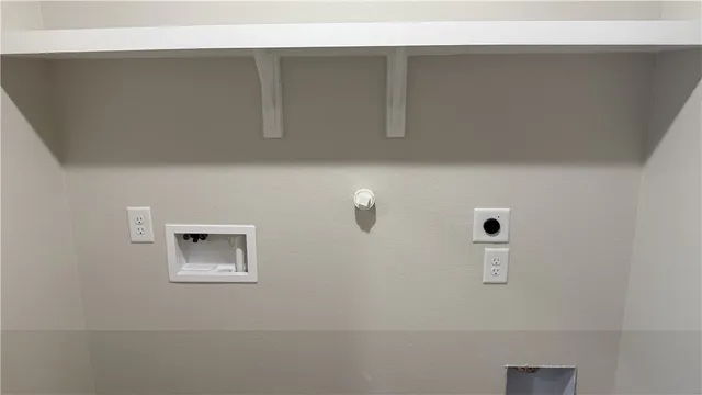 an empty room with wooden floor and closet