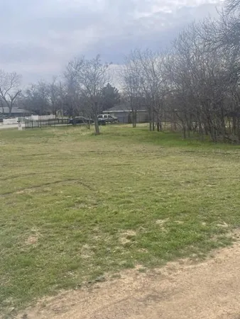 a view of a swimming pool and an outdoor space