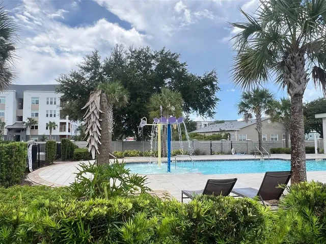 a view of a garden with a fountain
