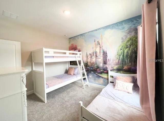 a living room with a couch and a table