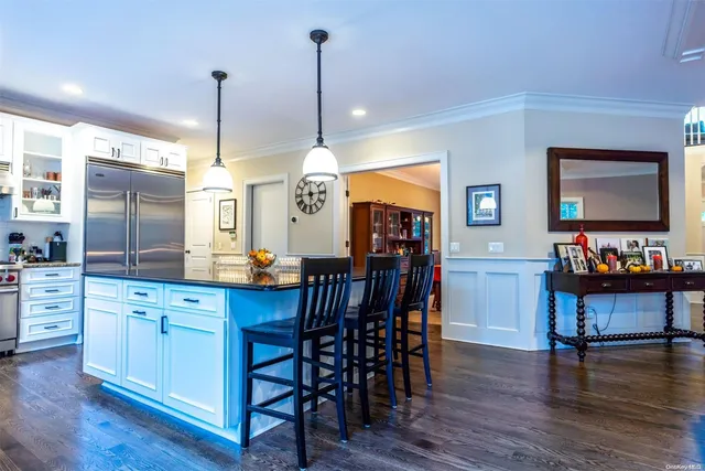 a view of a kitchen and dining room