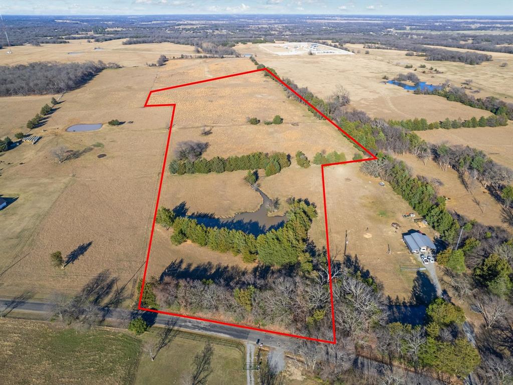 Tbdt Dugan Chapel Road Denison, TX 75021 - Photo 6 of 37 an aerial view of a house with a yard and lake view