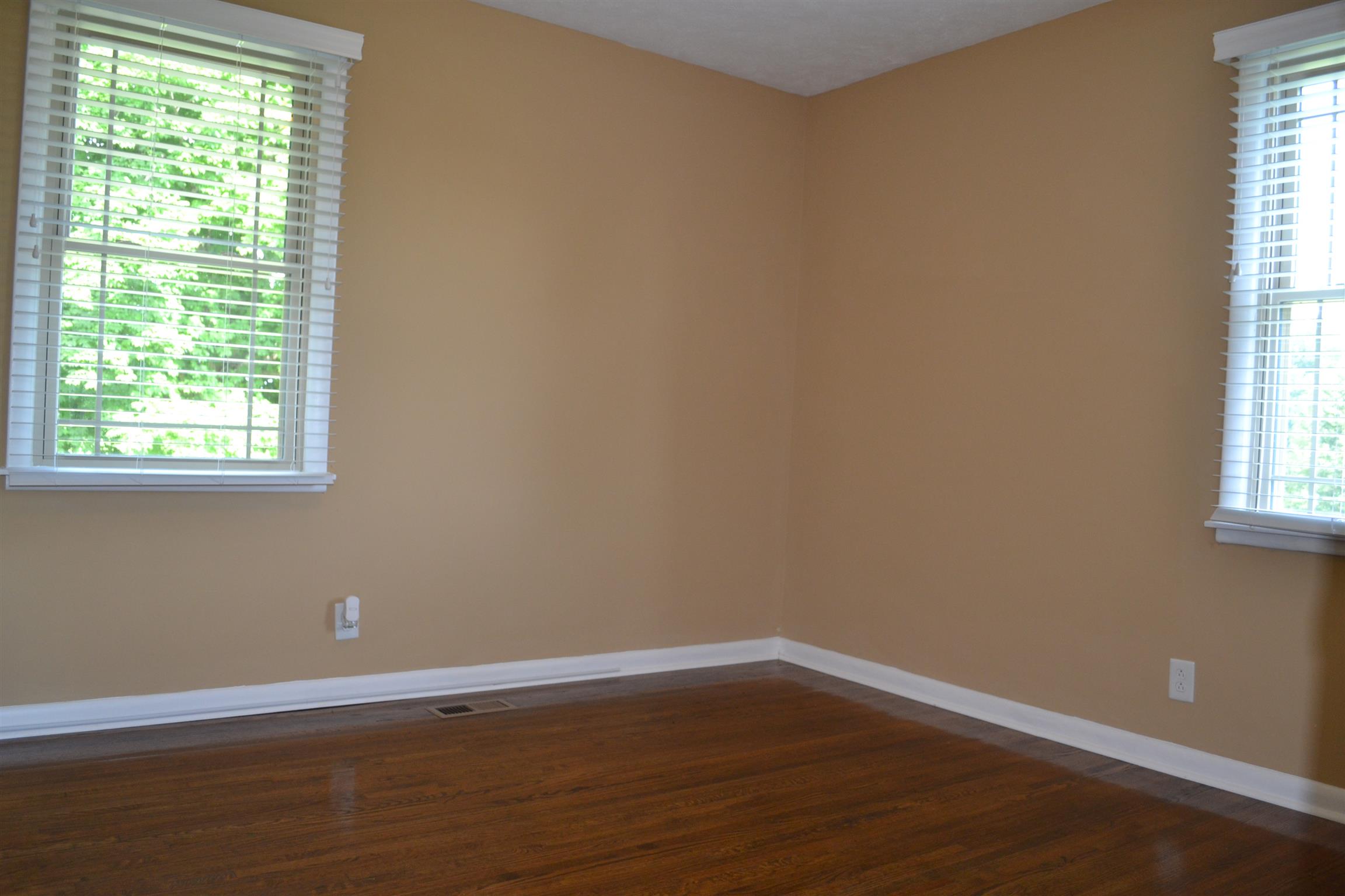 5089 Trough Springs Road Adams, TN 37010 - Photo 14 of 30 a view of a small space with wooden floor and a window