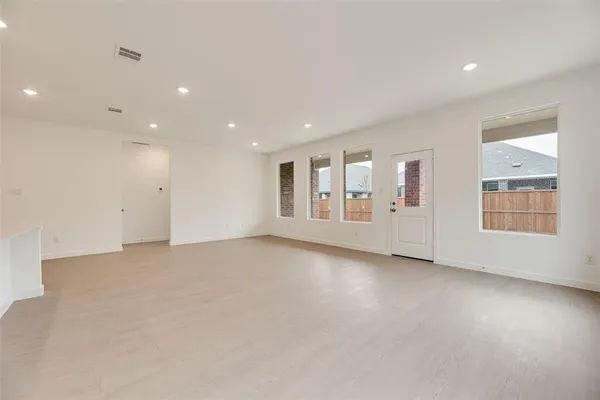 an empty room with windows