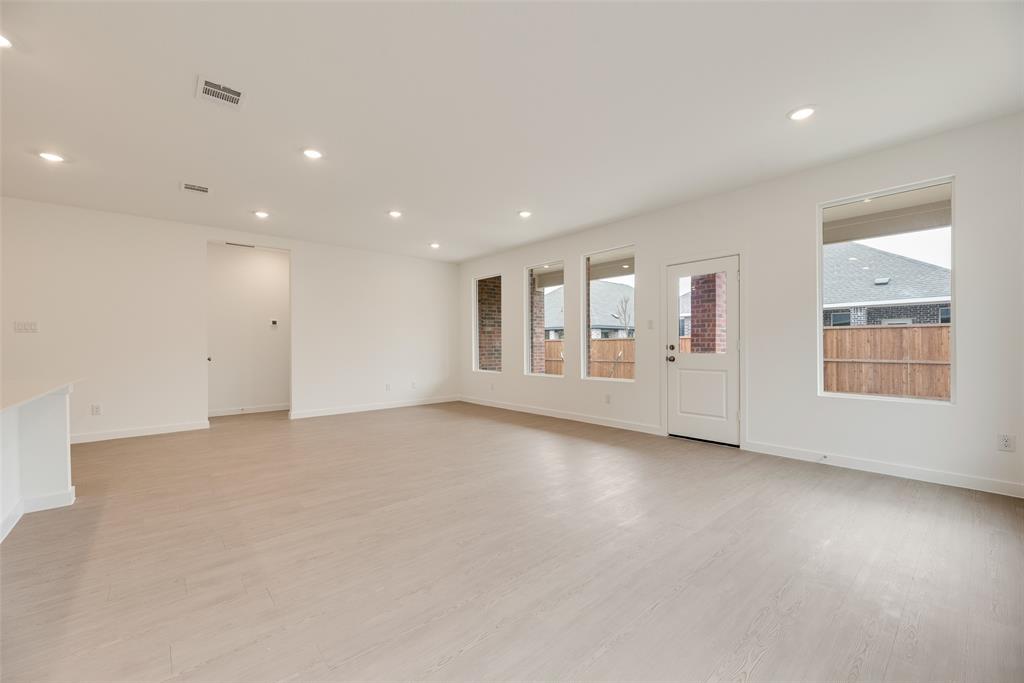 2416 Conroe Road Celina, TX 75009 - Photo 7 of 28 an empty room with windows