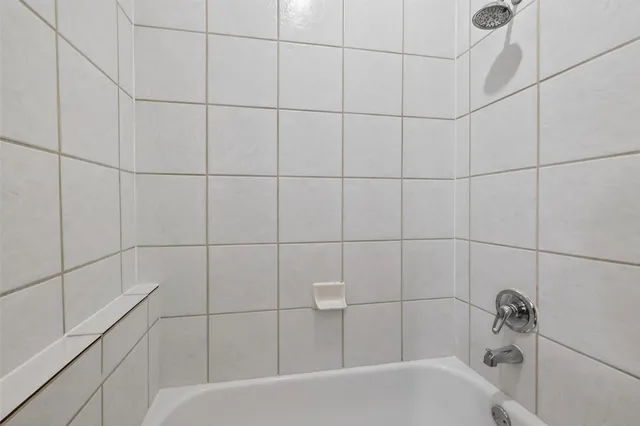 a bathroom with a bathtub