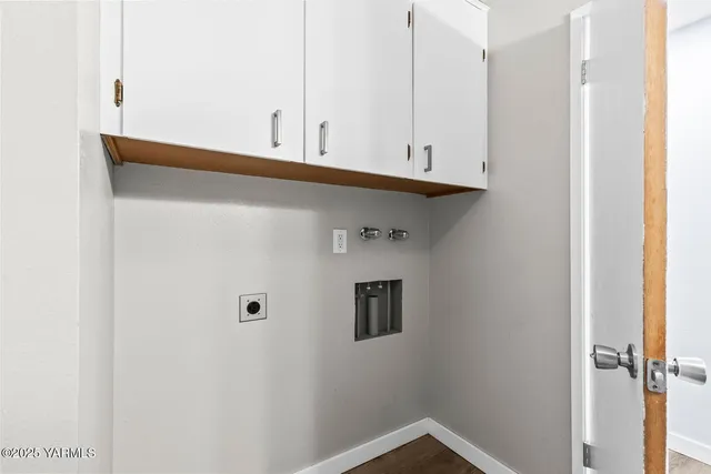 a bathroom with a sink and cabinets