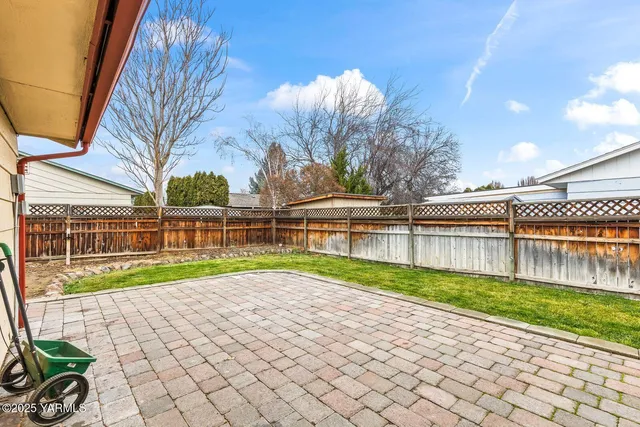 a view of backyard with green space