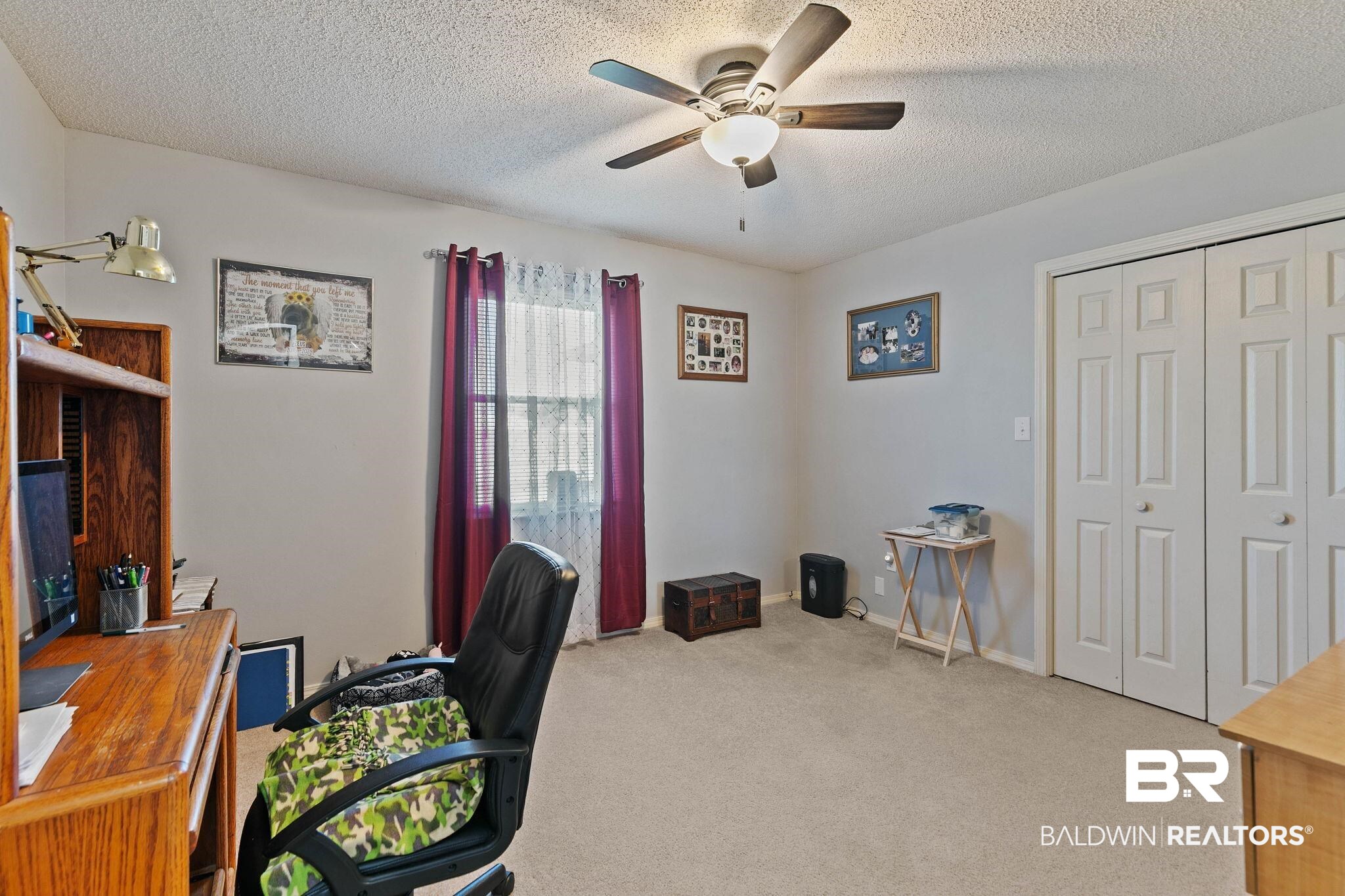 1510 South Juniper Street Foley, AL 36535 - Photo 24 of 36 Office space featuring light carpet, a ceiling fan, and a textured ceiling